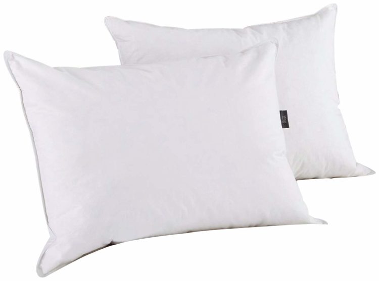 two white pillows with black tag