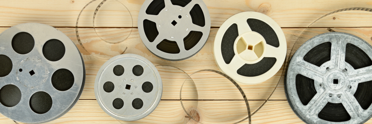 Why We Need a 'Bechdel Test' for Disability in Film Films on wooden table.