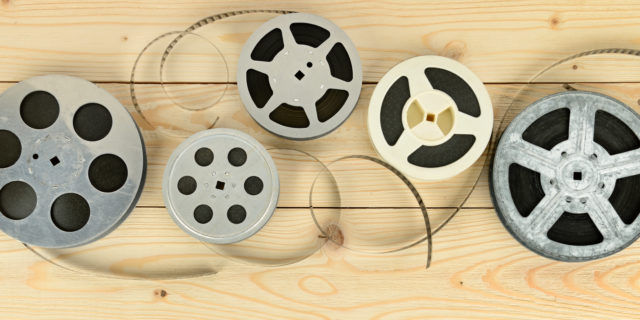 Why We Need a 'Bechdel Test' for Disability in Film Films on wooden table.