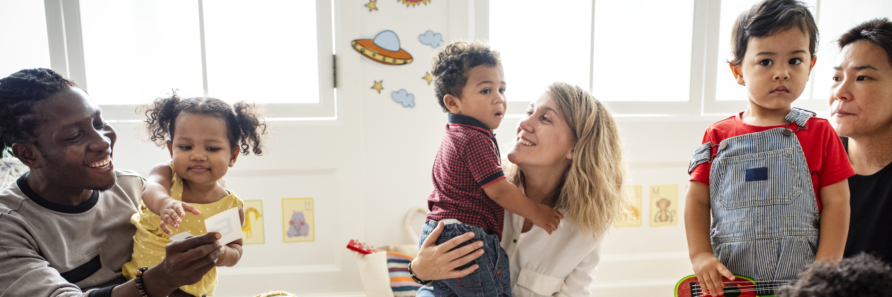 The Value of a Diagnosis for Children With Developmental Challenges Diverse children enjoying playing with toys.