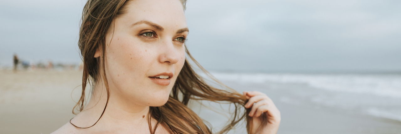 How Bipolar Disorder Medication Affects Weight and Body Image A woman at the beach