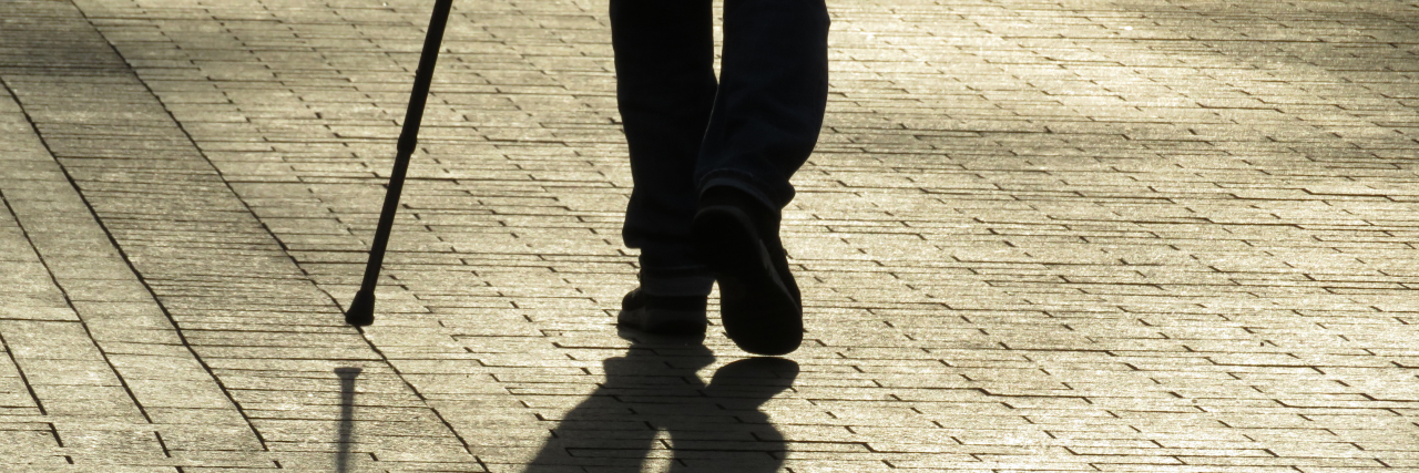 What Independence Means as a Blind Person Silhouette of man walking with a cane.