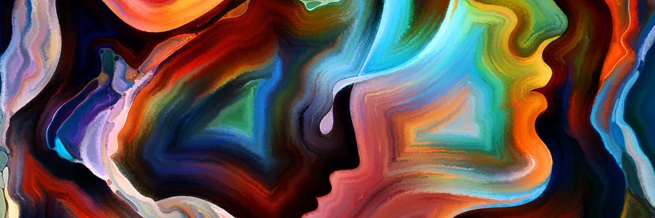colorful paint and abstract outlines of woman's face