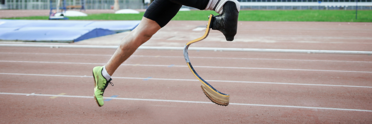 How Language Affects Perceptions of Disability Amputee runner on track.
