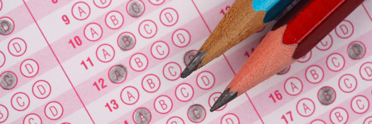 How the College Admissions Scandal Harms Students With Disabilities Standardized test exam form and pencils.