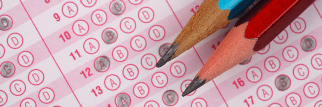 Standardized test exam form and pencils.