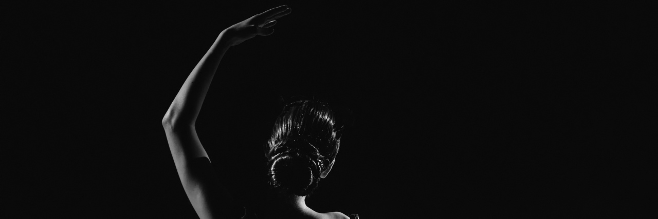 Black and white photo of dancer.