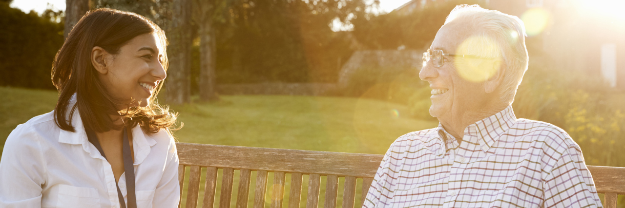 22 Questions to Ask an Assisted Living Facility Woman Visiting Senior Male Relative In Assisted Living Facility