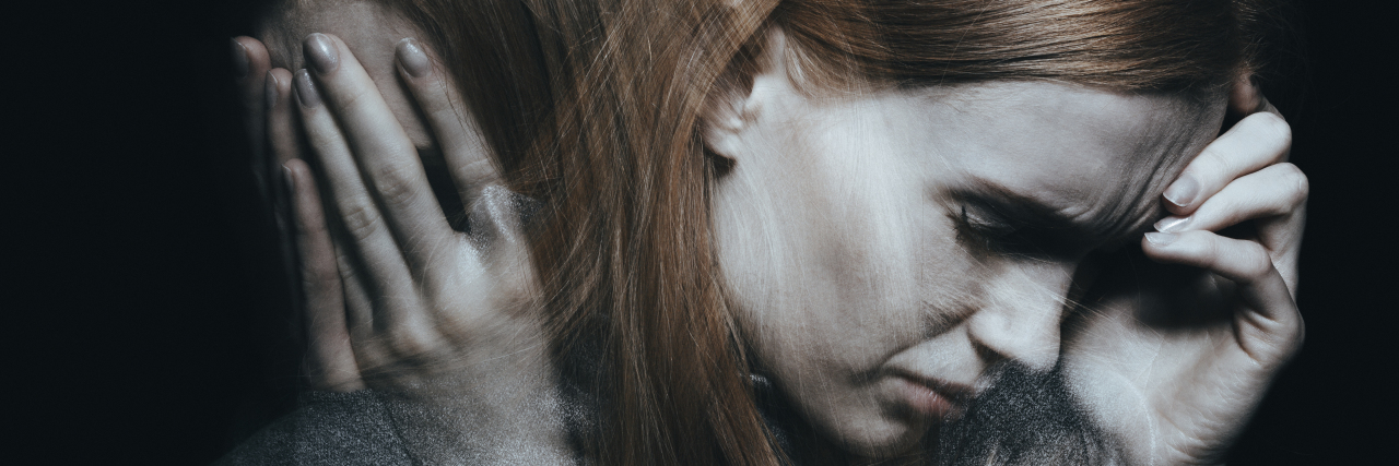 Finding the Cause of My Chronic Migraine Headaches Woman in pain from a migraine.