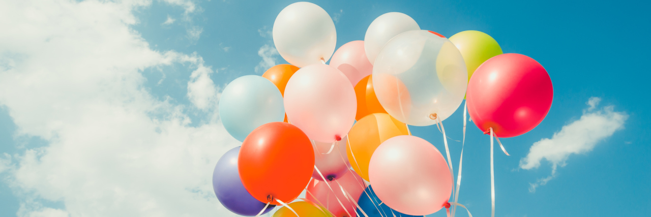 5 Steps to Embracing the Reality of Someone With Dementia Colorful balloons done with a retro instagram filter effect. Concept of happy birth day in summer and wedding, honeymoon party use for background. Vintage color tone style