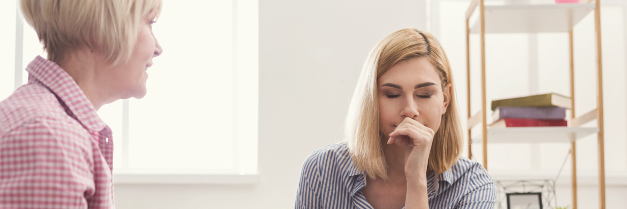My Parents Think I Have No Motivation Portrait of adult mother shouting at daughter while young woman closed eyes. Generation and relationship concept
