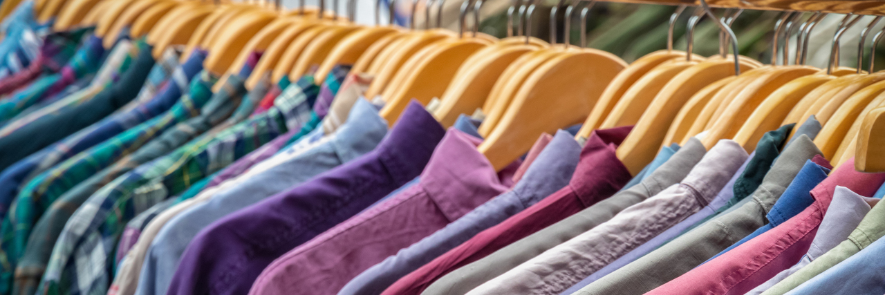 Shirts on clothing rack.