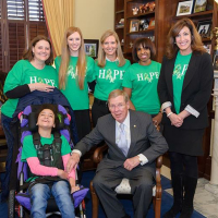 Cynthia with her daughter and RFTS volunteers at Senator Isakson's office getting Cerebral Palsy Awareness Day recognized in Washington.