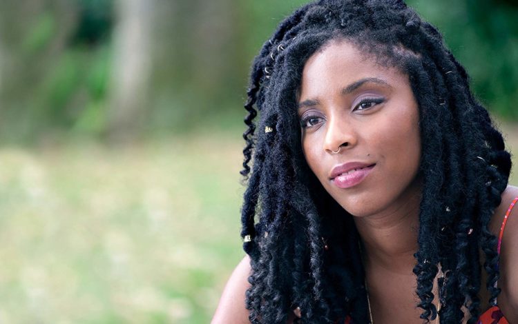 Jessica Williams long hair looking away from camera