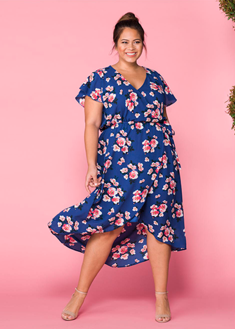 Plus size model wearing flowy dress