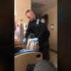 officer searching bags in nolan sousley's hospital room