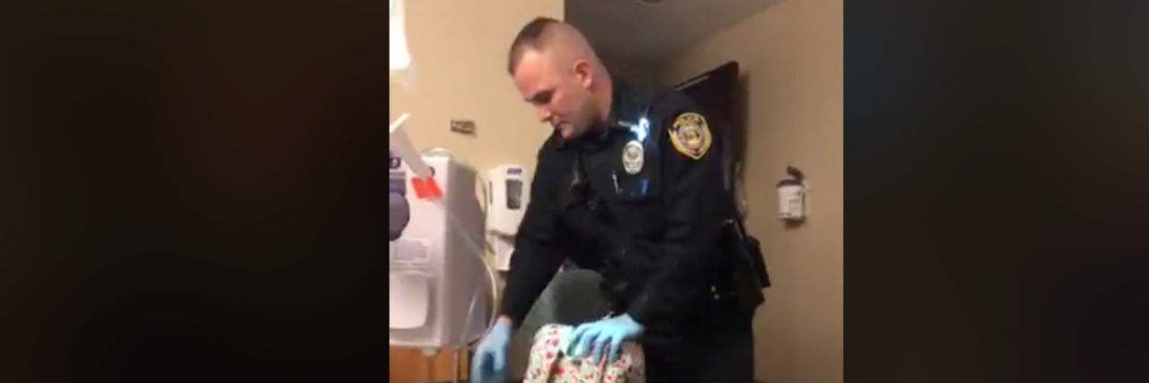 officer searching bags in nolan sousley's hospital room