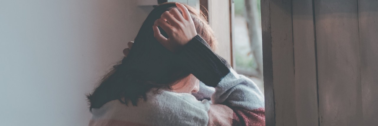 Sometimes Depression is Feeling Emotional Numbness woman looking out window