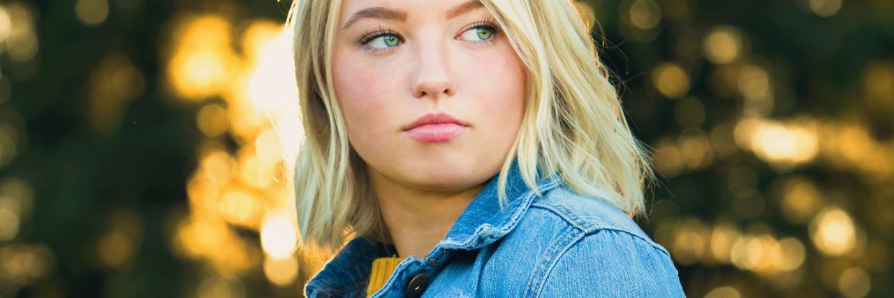 When Anxiety Changes and New Things Become Triggers photo of blonde teen looking off camera with concerned expression