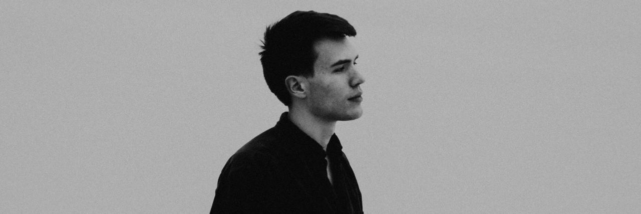 Reddit User Posts About Being Unable to Find Mental Health Support man looking at ocean