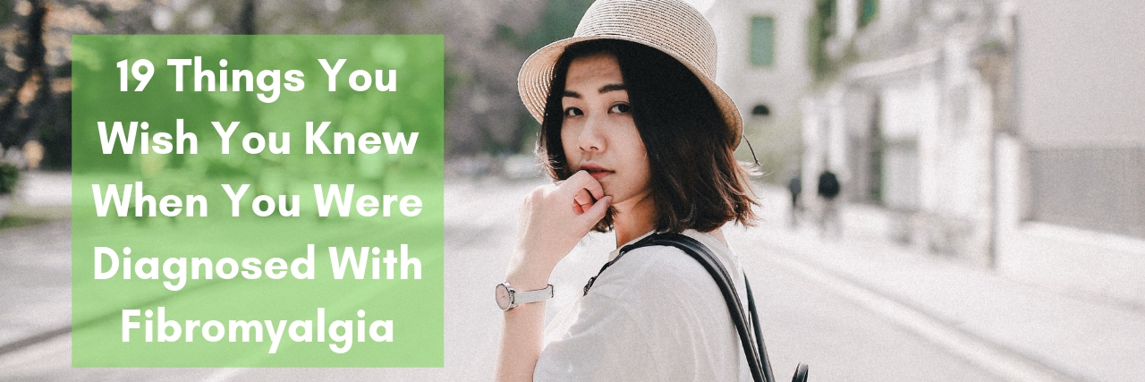 Things Those With Fibromyalgia Wish They Knew When They Were Diagnosed woman with short black hair looking at camera while standing in street