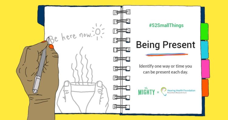 52 Small Things challenge graphic that shows bright yellow background with an open journal with the words: "Being Present: Identify one way or time to be present this week." Co-hosted by Hearing Health Foundation