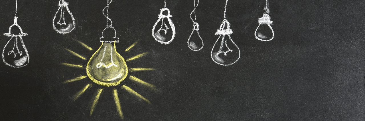 Finding Solutions in My Life With Learning Disabilities Drawing of light bulbs with one lit up.