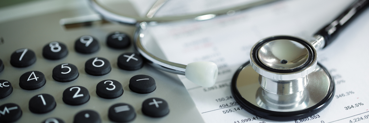 What Is Medicare for All and How Could It Affect You? Calculator and stethoscope on financial statement concept for finance health check or cost of healthcare