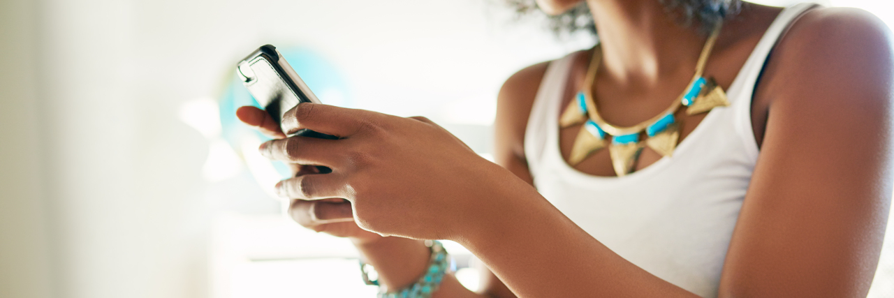 Abled Privilege and Disability Monitoring on Social Media Woman using smartphone.