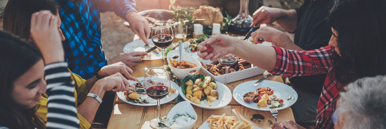 How to Respond When People Question Food Choices Because of Diabetes Family dining outdoor at backyard patio