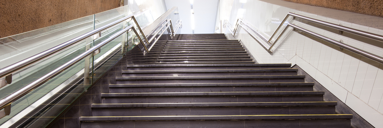 Disability Inclusion Means Changing Attitudes Stairs at a subway station.