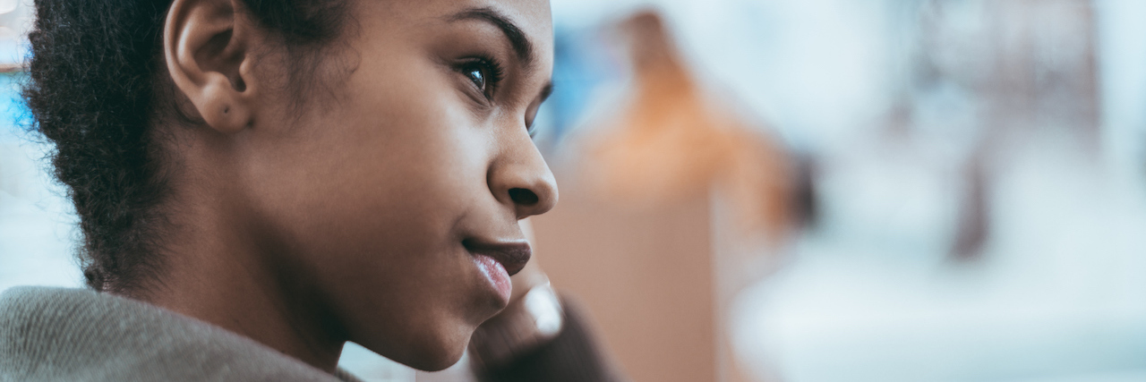 The Truth About Autism Functioning Labels An African American woman, looking to the side