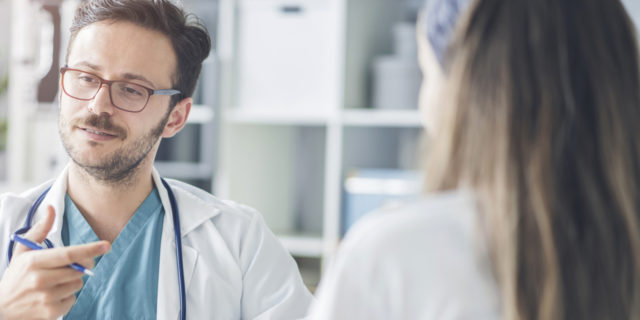 When a Doctor Couldn't Look Me in the Eye to Tell Me My Diagnosis doctor looking away from patient