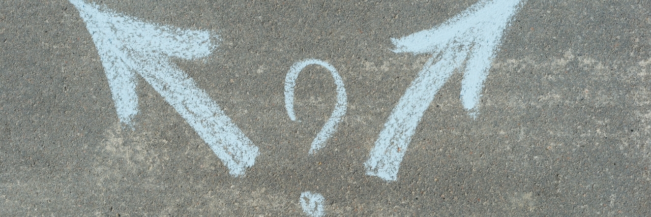 What a Visual Perception Disability Is Like Woman trying to decide which direction to go.