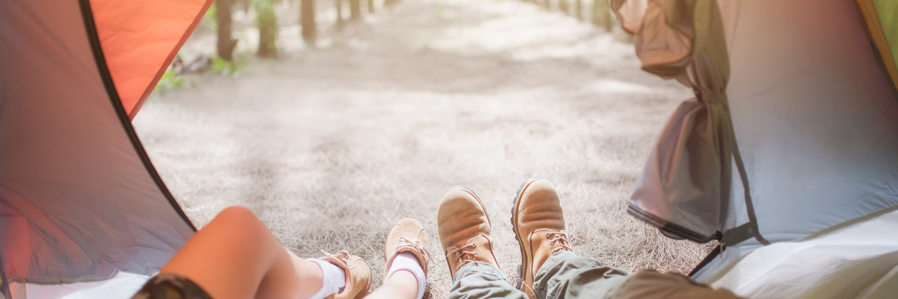 What My Wife's Von Hippel-Lindau Syndrome Taught Me About Life a couple is laying down in a tent