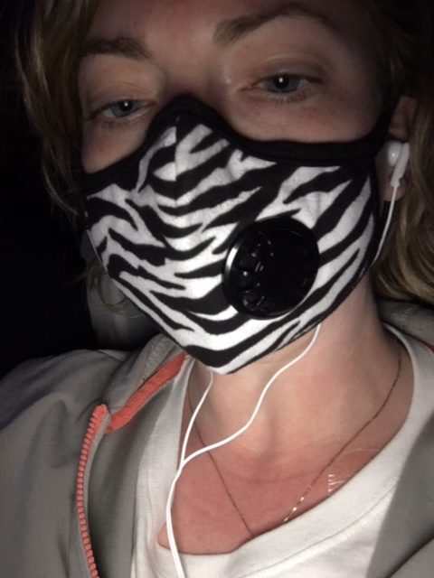 author wearing a zebra striped medical mask