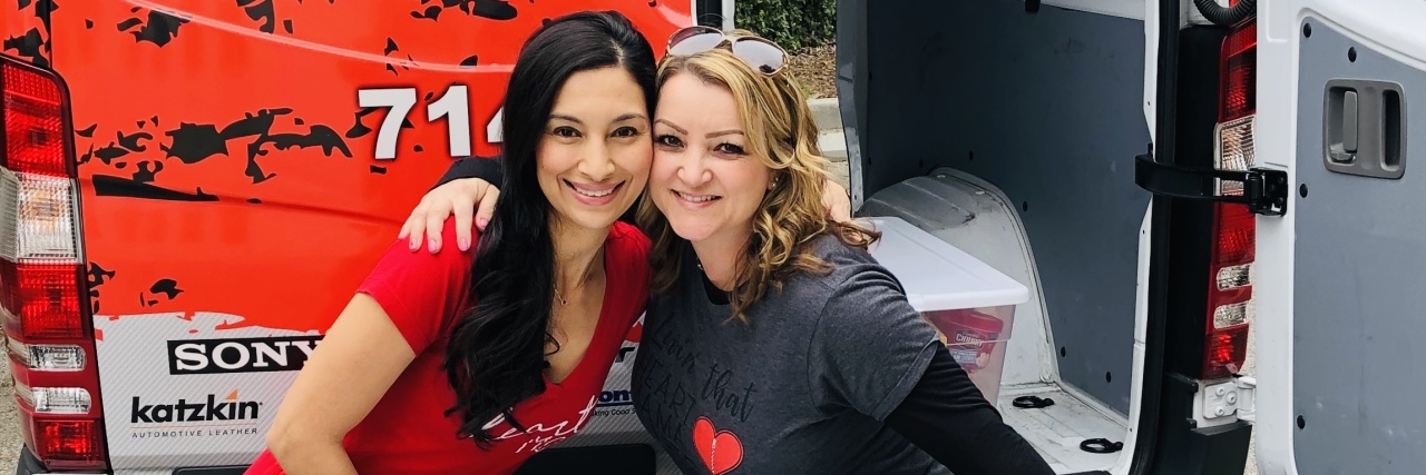 When I Realized My Next Door Neighbor Was Also a Heart Mama Two moms hugging each other