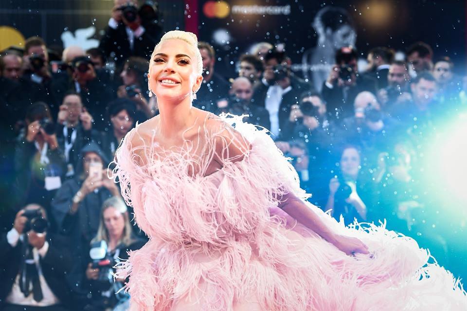 Lady Gaga wearing pink dress on red carpet
