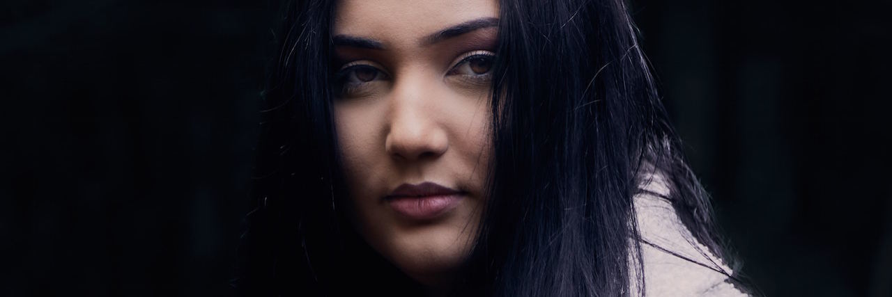 The First Time I Stood Up to My Abusive Mom A woman with dark hair