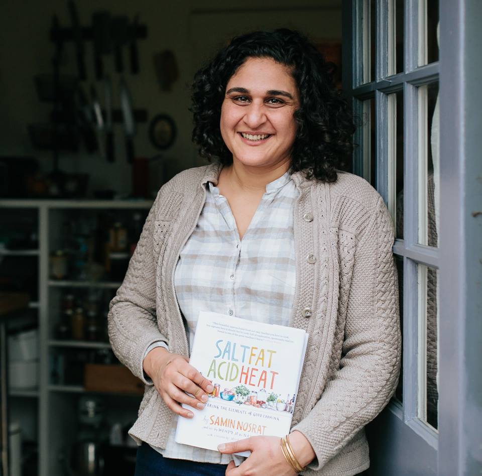 Samin Nosrat holding "Salt, Fat, Acid, Heat"