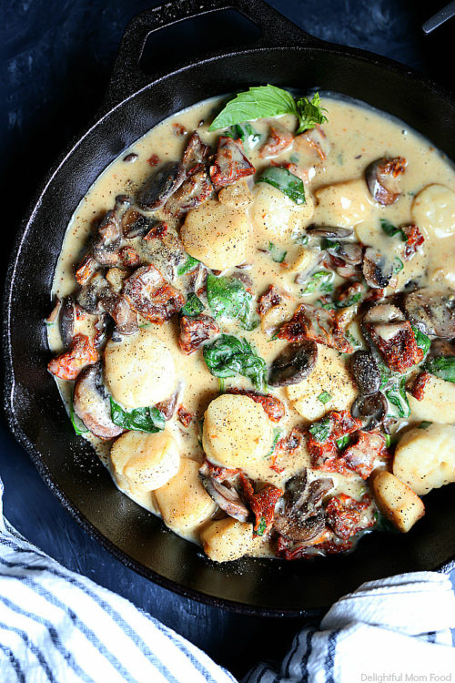 mushroom scallop creamy sauce in cast iron skillet