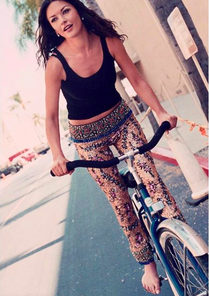 Image of Catherine Zeta-Jones riding a bicycle