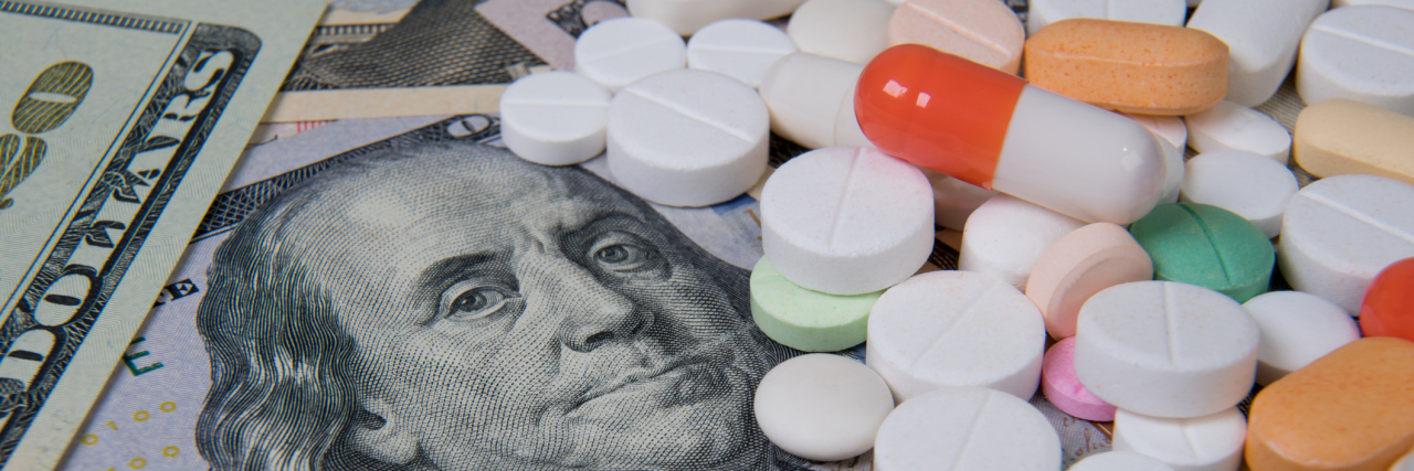 Various medicines on the US dollar. The rising cost of health care.