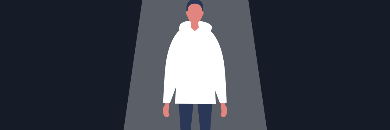 It's Time to Shine a Light on Chronic Pain Woman standing in the spotlight.