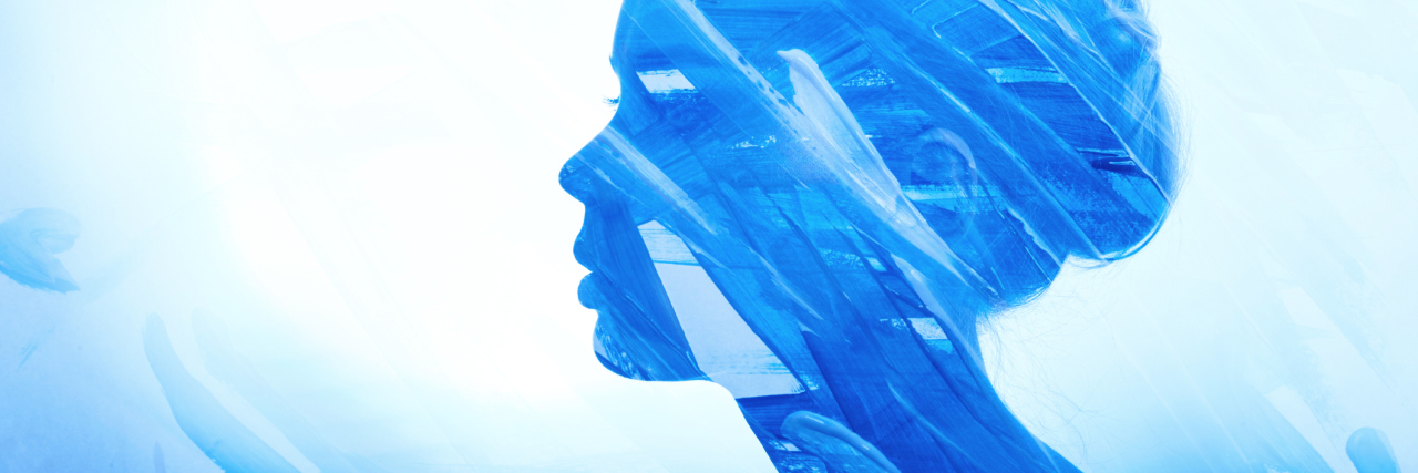 How People With Eating Disorders View Themselves blue watercolor painting of a woman's profile