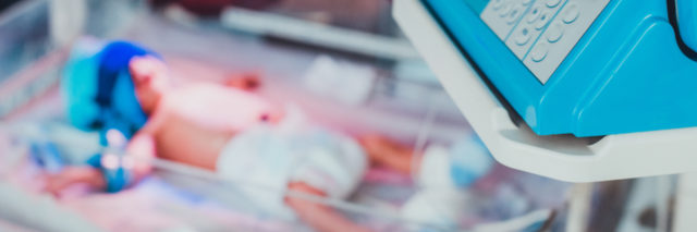 blurred photo of a baby in the NICU