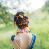 Woman with flowers in her hair.