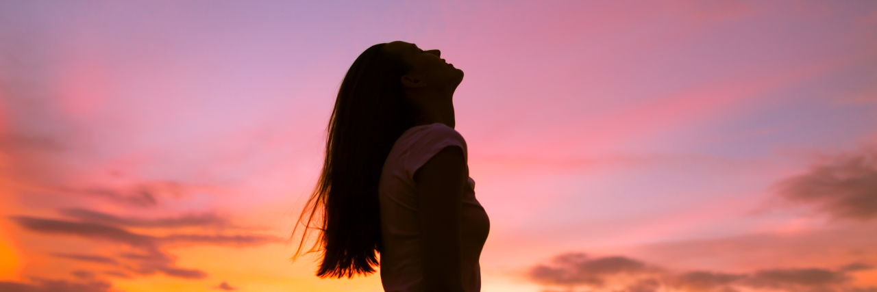 Open Letter to Children With Cerebral Palsy Woman looking up into the sky.