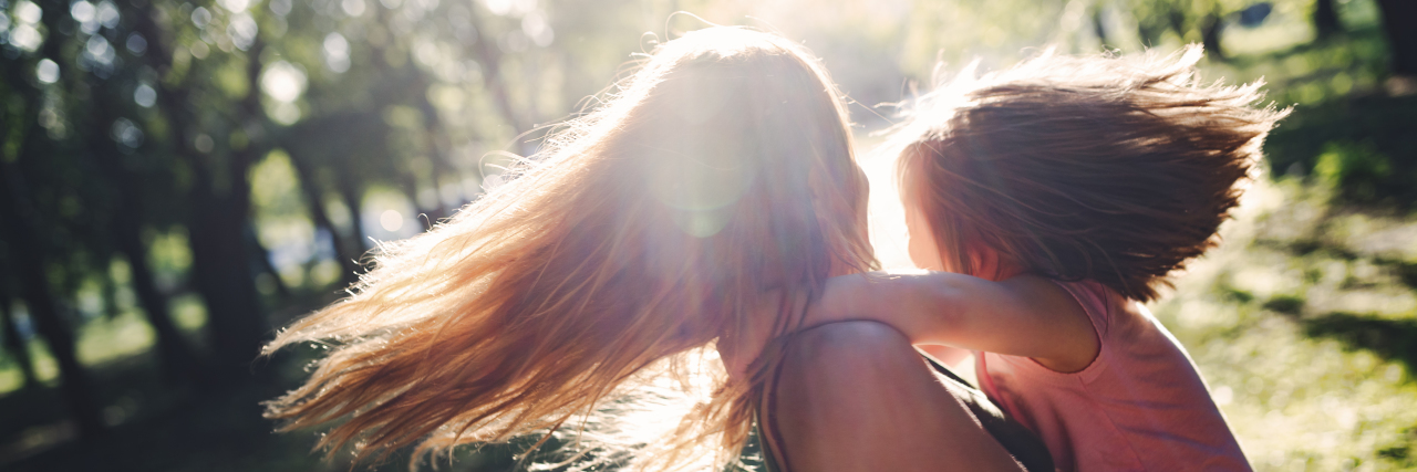 Parents, It's Important to Accept Your Child’s Disability Picture of mother and her child with a disability.