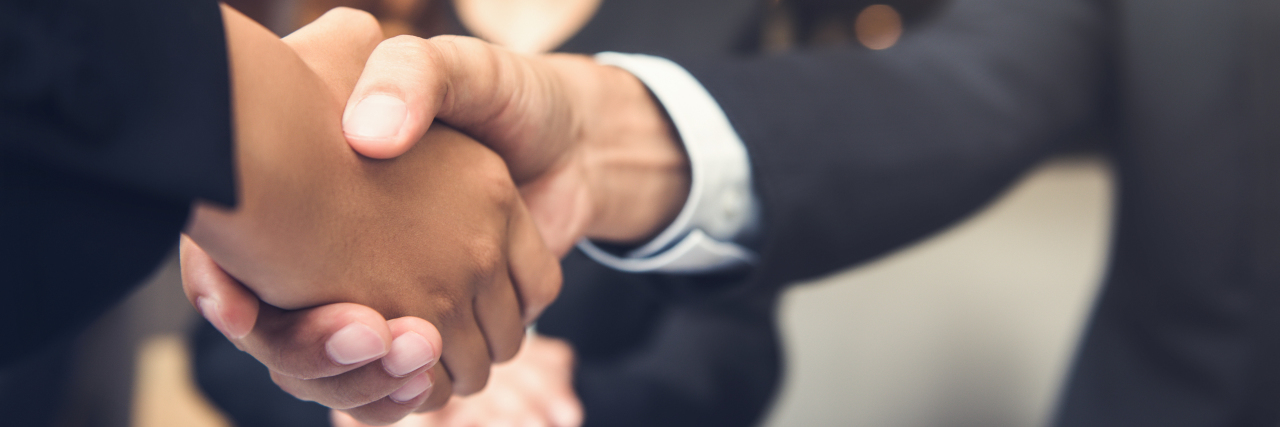 Answering 'How Are You?' as a Person With Chronic Illness Shaking hands.